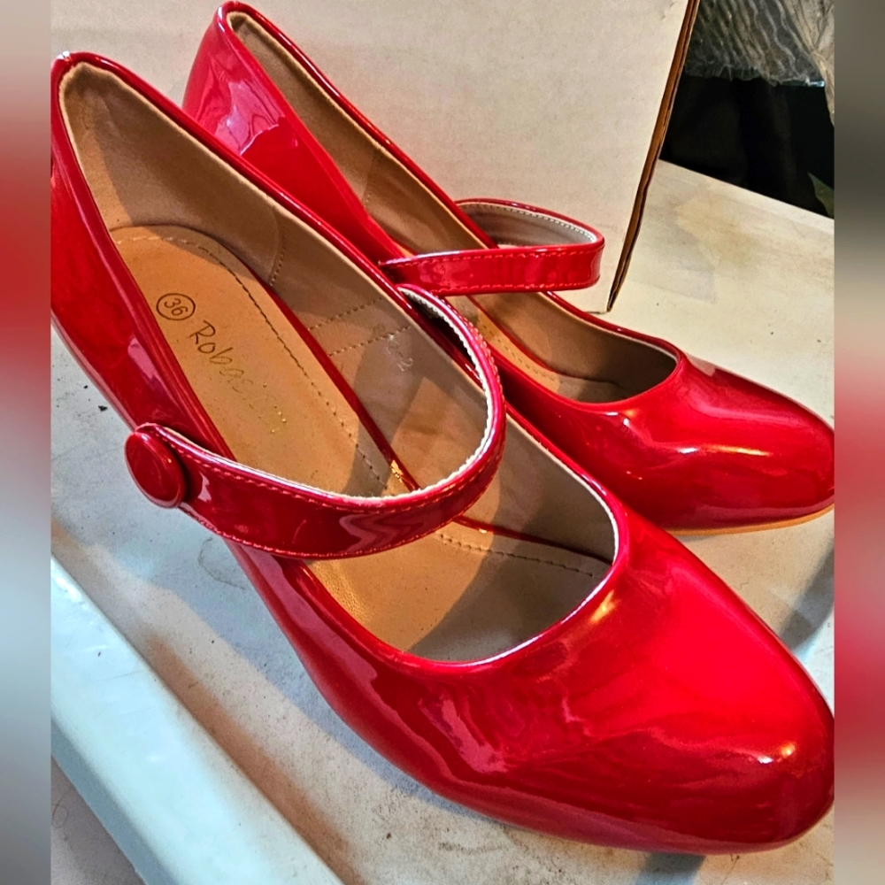 Red heels, size 36. 2.5" heel height.